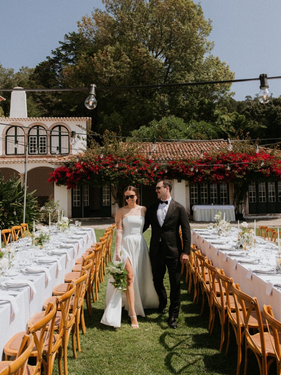 Couple walking between tables