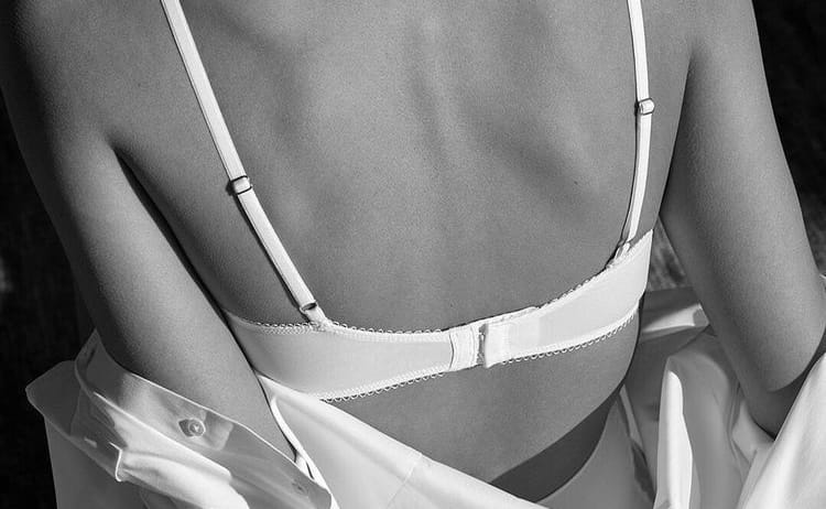woman wearing a white bra